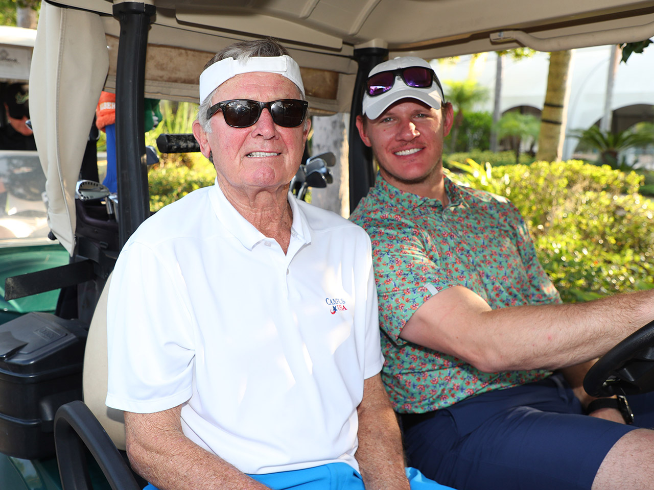 Coach Steve Spurrier & A.J. Edds of the Big Ten Conference ready to tee it up