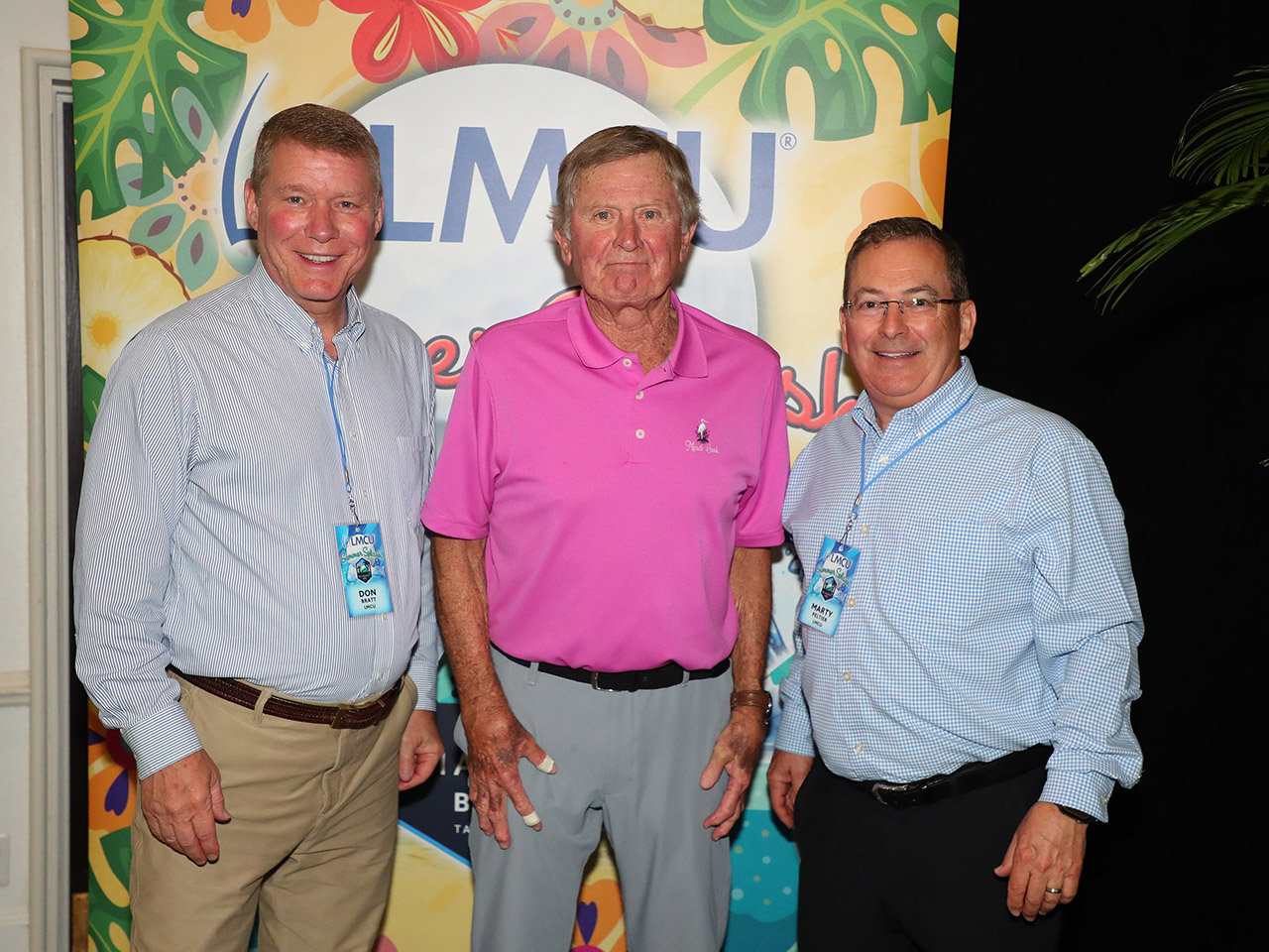 LMCU executives Don Bratt and Marty Peltier with Coach Steve Spurrier